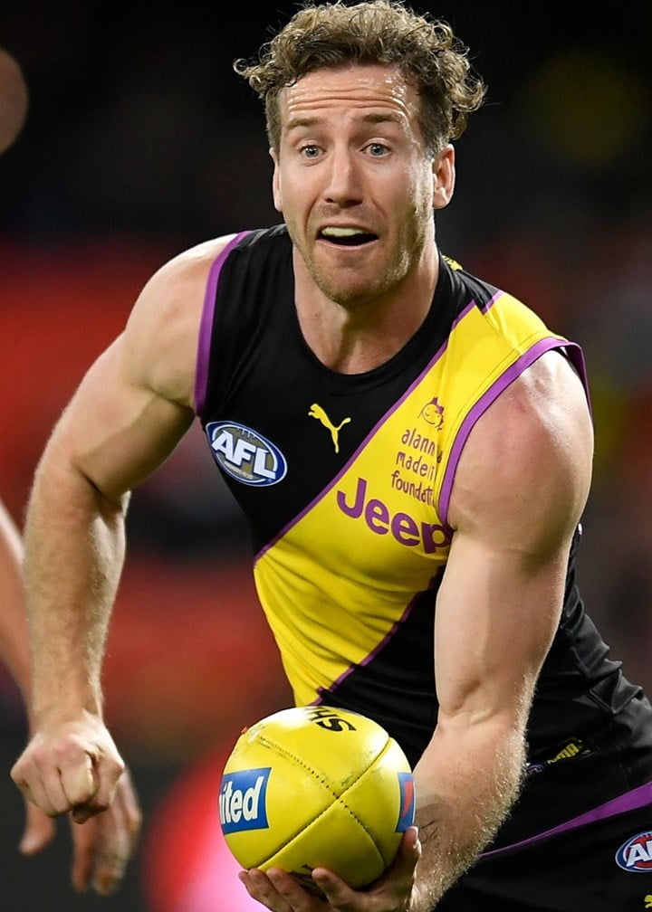 Channel Seven sports presenter confirmed her relationship with AFL star Kane Lambert following months of rumours.