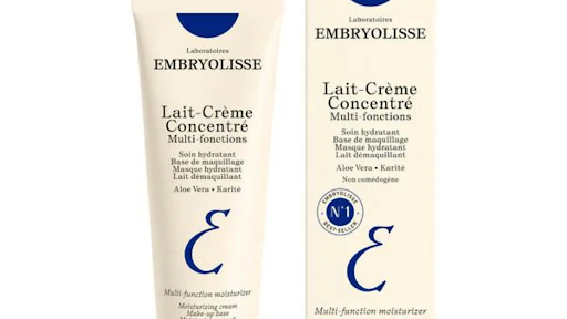 A flat lay of luxury skincare, Adidas sneakers, and fashionable activewear on a bright background.