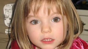 A forensic team conducting a search for Madeleine McCann in a remote wooded area under new police funding.