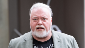 Kyle Sandilands looking shocked after hearing his ARN radio contract was terminated by the network.