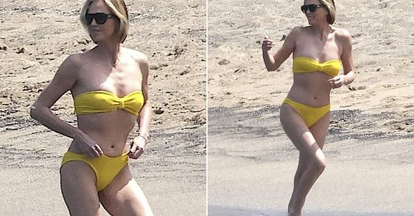 A-list actress 50 stuns in bikini on holiday while relaxing on a white sand beach in the Bahamas.