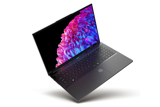 The Acer Swift 16 AI laptop open on a desk, highlighting its massive haptic touchpad and vibrant OLED display.