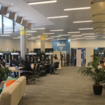 The iconic Fishburners Sydney coworking space entrance with entrepreneurs working in the background.
