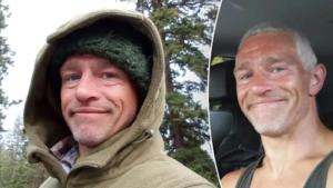 Portrait of Alaskan Bush People reality TV personality Matt Brown smiling outdoors in a hooded jacket.
