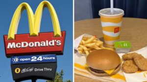 A close-up shot of a McDonald’s paper bag and fries on a wooden table, representing fast food price changes.