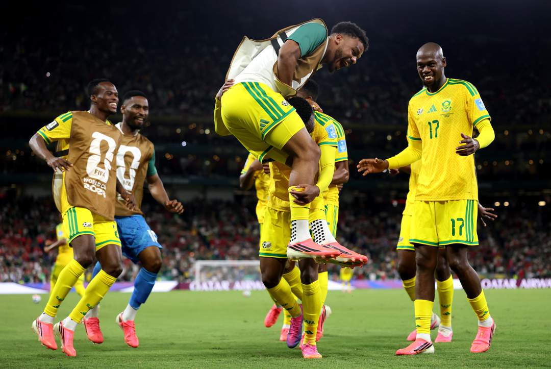 South Africa national soccer team celebrating their historic 1-0 win over South Korea at the 2026 FIFA World Cup.