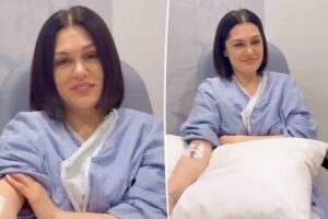 Singer Jessie J smiling alongside Chanan Colman and their son Sky in a candid, heartfelt family photograph.