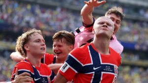 Erling Haaland celebrates scoring for Norway at the FIFA World Cup 2026, breaking tournament scoring records.