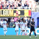 Belgium players celebrate scoring against USMNT at the 2026 FIFA World Cup after Folarin Balogun ban drama.