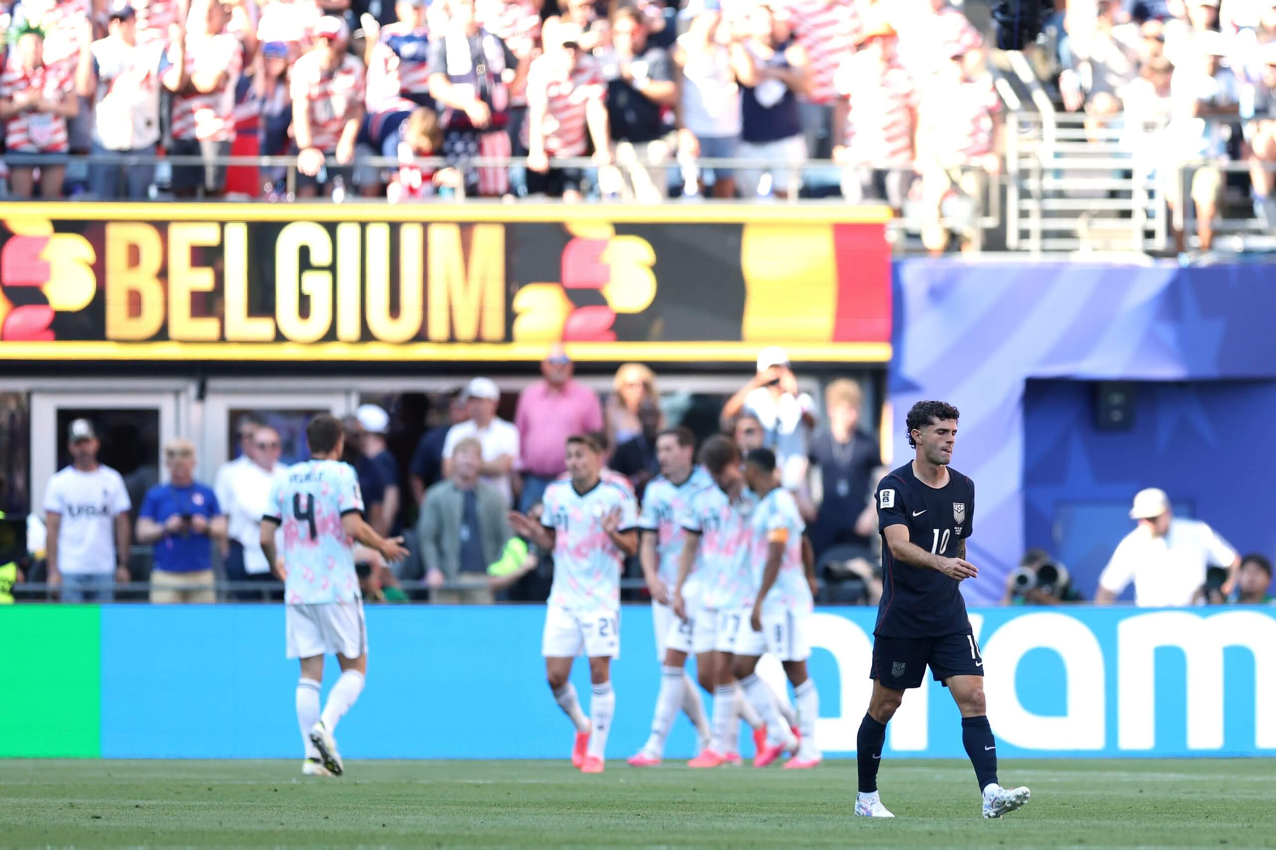 Belgium players celebrate scoring against USMNT at the 2026 FIFA World Cup after Folarin Balogun ban drama.