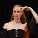 Vera Blue New Album Diagnosis highlighted during her emotional live stage performance under vibrant light beams