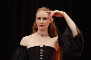Vera Blue New Album Diagnosis highlighted during her emotional live stage performance under vibrant light beams